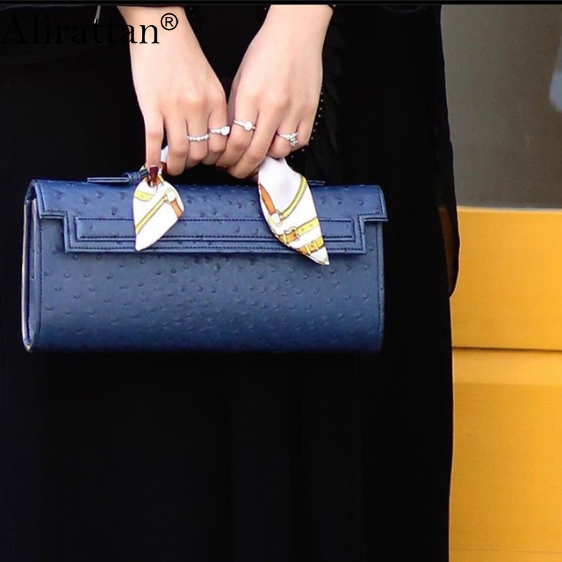 กระเป๋าคลัทช์ลายหนังนกกระจอกเท - Embroidery Wallet บทวิจารณ์และราคา